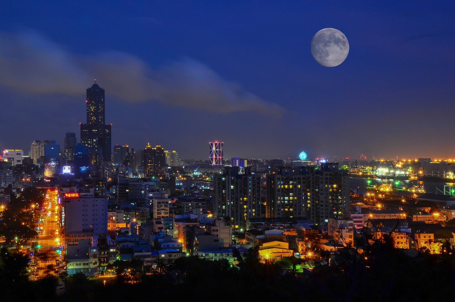 Moon Over City Skyline